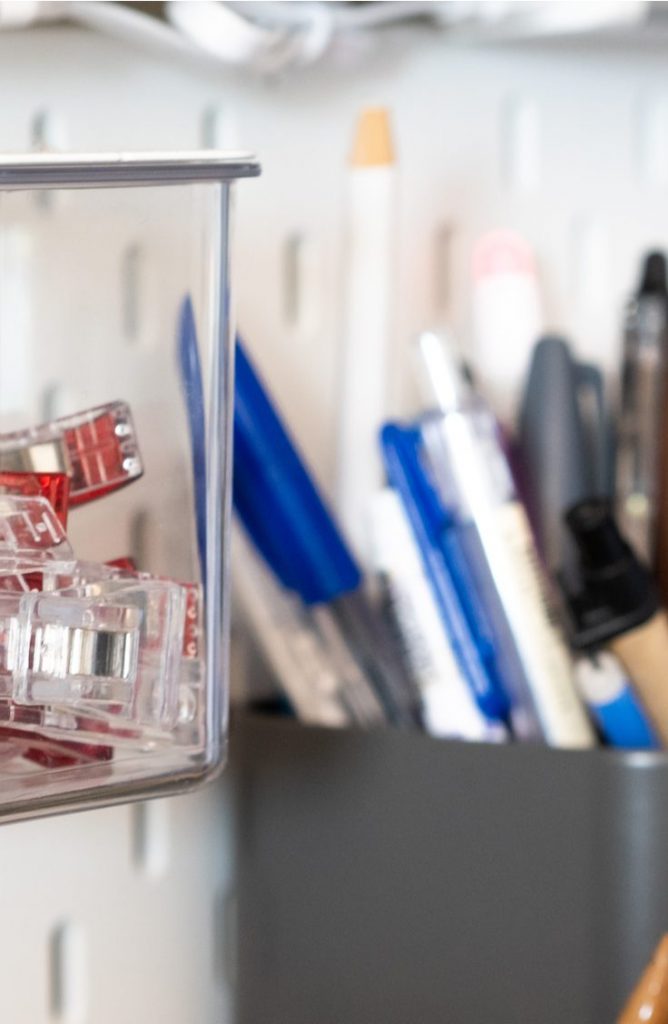 Install pegboard in one of your drawers with wooden dowels to create an unbeatable storage unit. You can store things like plates, utensils, and more using this easy organization method. These are can't miss pegboard ideas!