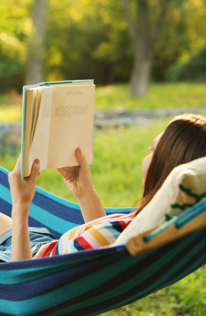 Want to read a book outside but don't have a place to sit and relax? The summer heat can be beat with a DIY hammock stand! Check it out!