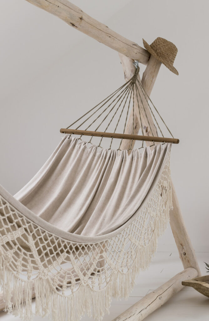 Are you in need of a hammock stand? The summer heat can be beat with a DIY hammock stand! Check it out!